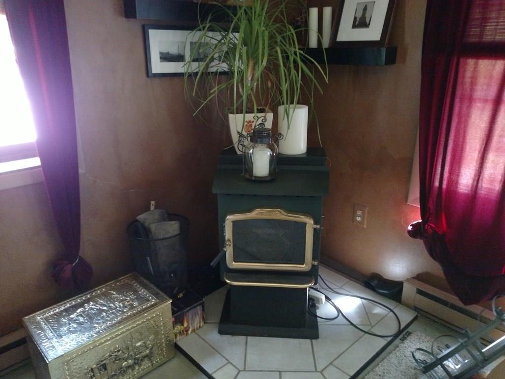 3 Wolf Creek Road Cape Neddick, ME 03902 - Photo 11 of 17 This pellet stove is included with...