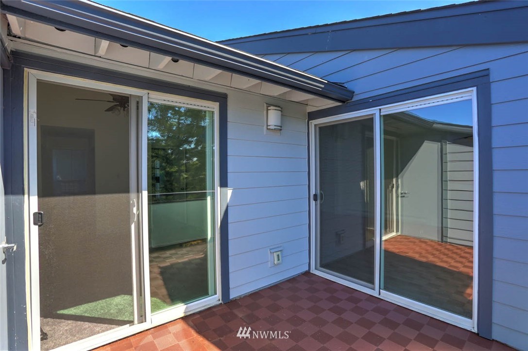 2515 Northeast 4th Street, Unit 531 Renton, WA 98056 - Photo 15 of 28 a view of porch with a door