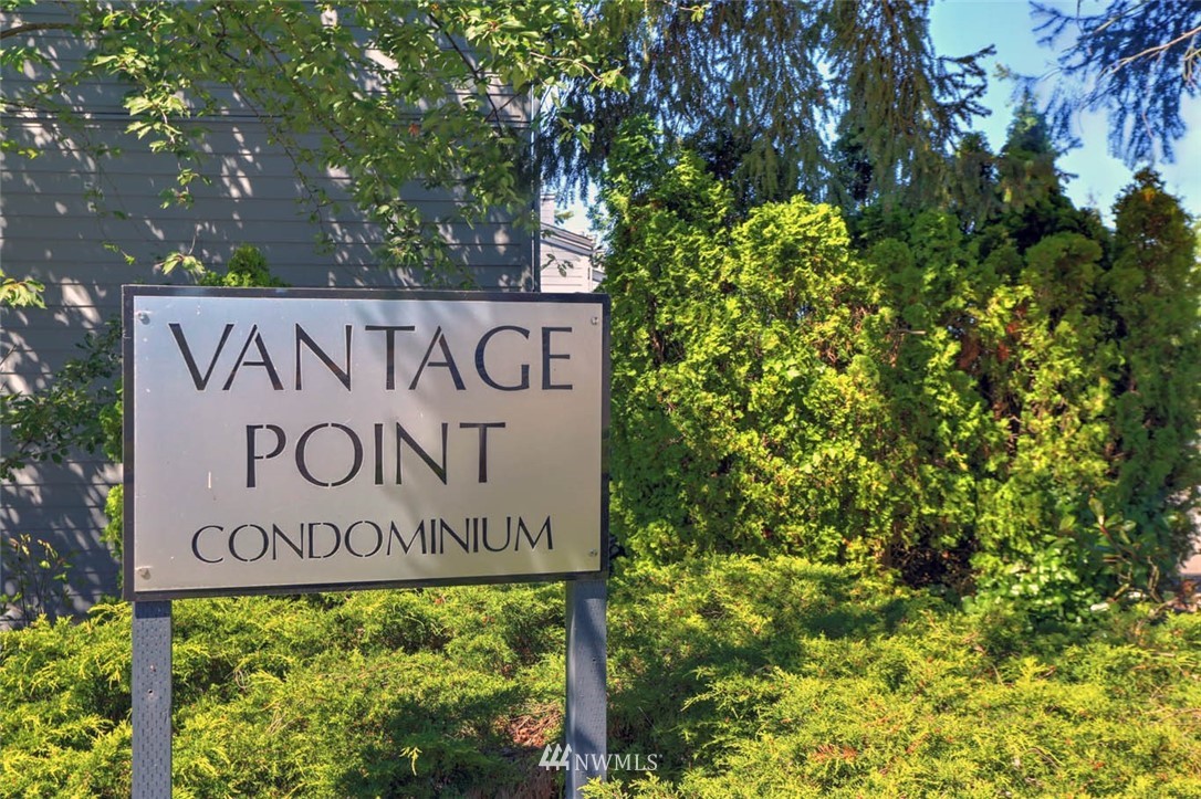2515 Northeast 4th Street, Unit 531 Renton, WA 98056 - Photo 5 of 28 a sign broad next to a road