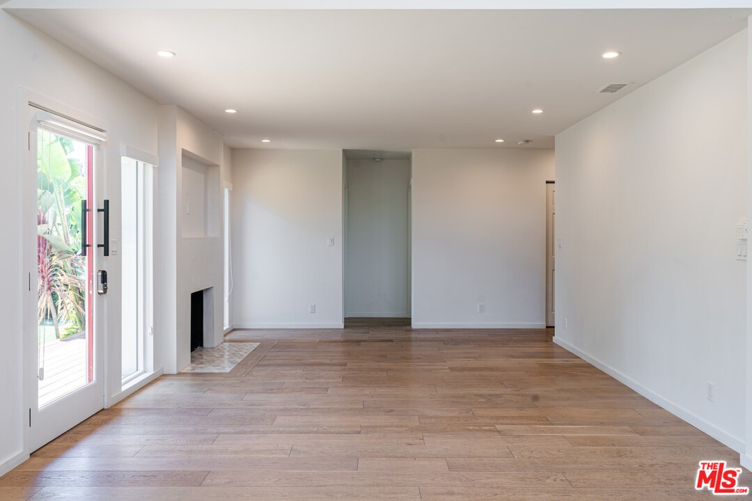 4518 Alla Road Los Angeles, CA 90066 - Photo 5 of 23 an empty room with wooden floor and windows