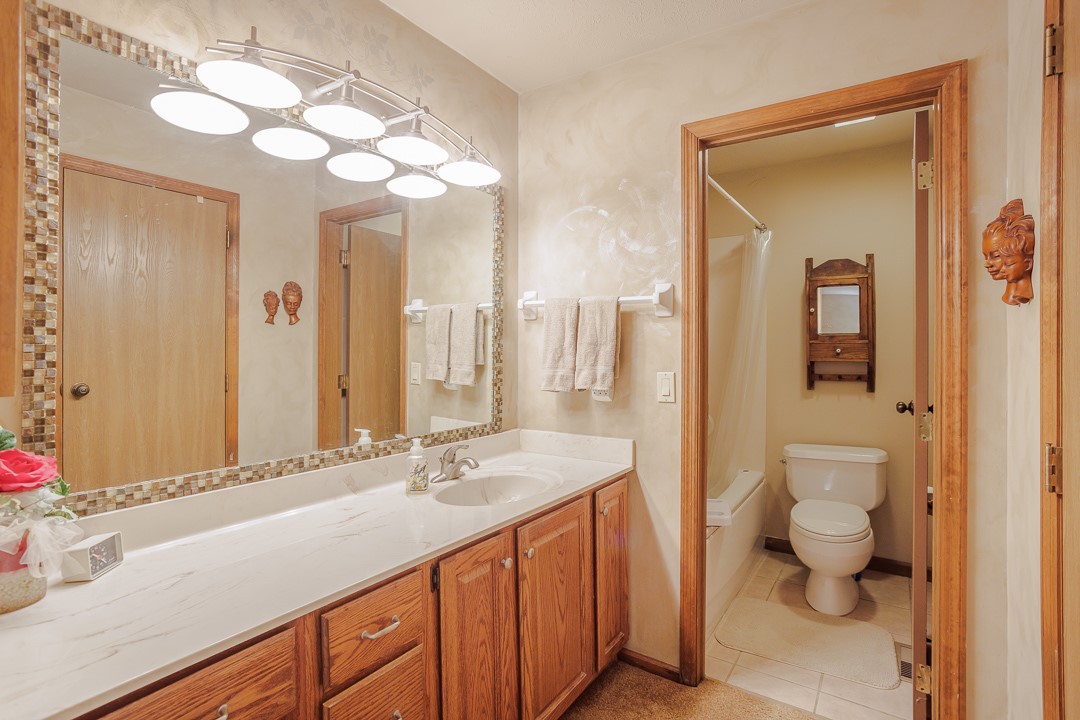 540 Basil Street Springboro, OH 45066 - Photo 17 of 32 This bathroom features a single vanity and a combination bathtub and shower.