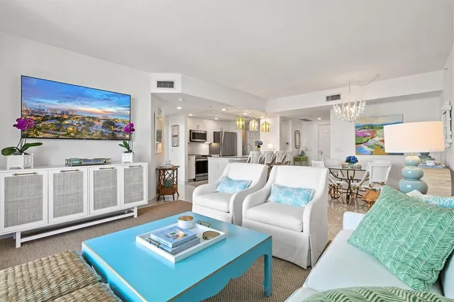 a bed room with a bed and a painting on the wall