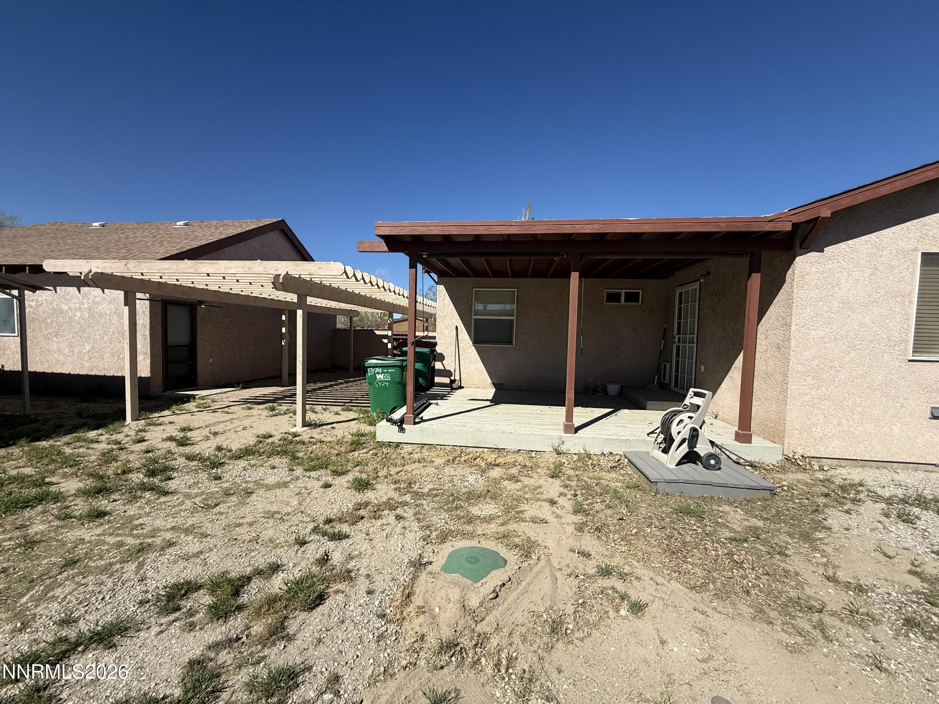 5424 Desert Hills Loop Fallon, NV 89406 - Photo 20 of 21 a view of a house with a patio
