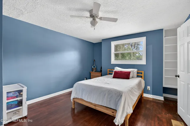 a view of a bedroom from a hallway