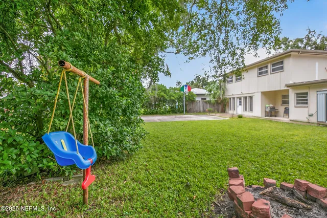 a view of a garden with a bench
