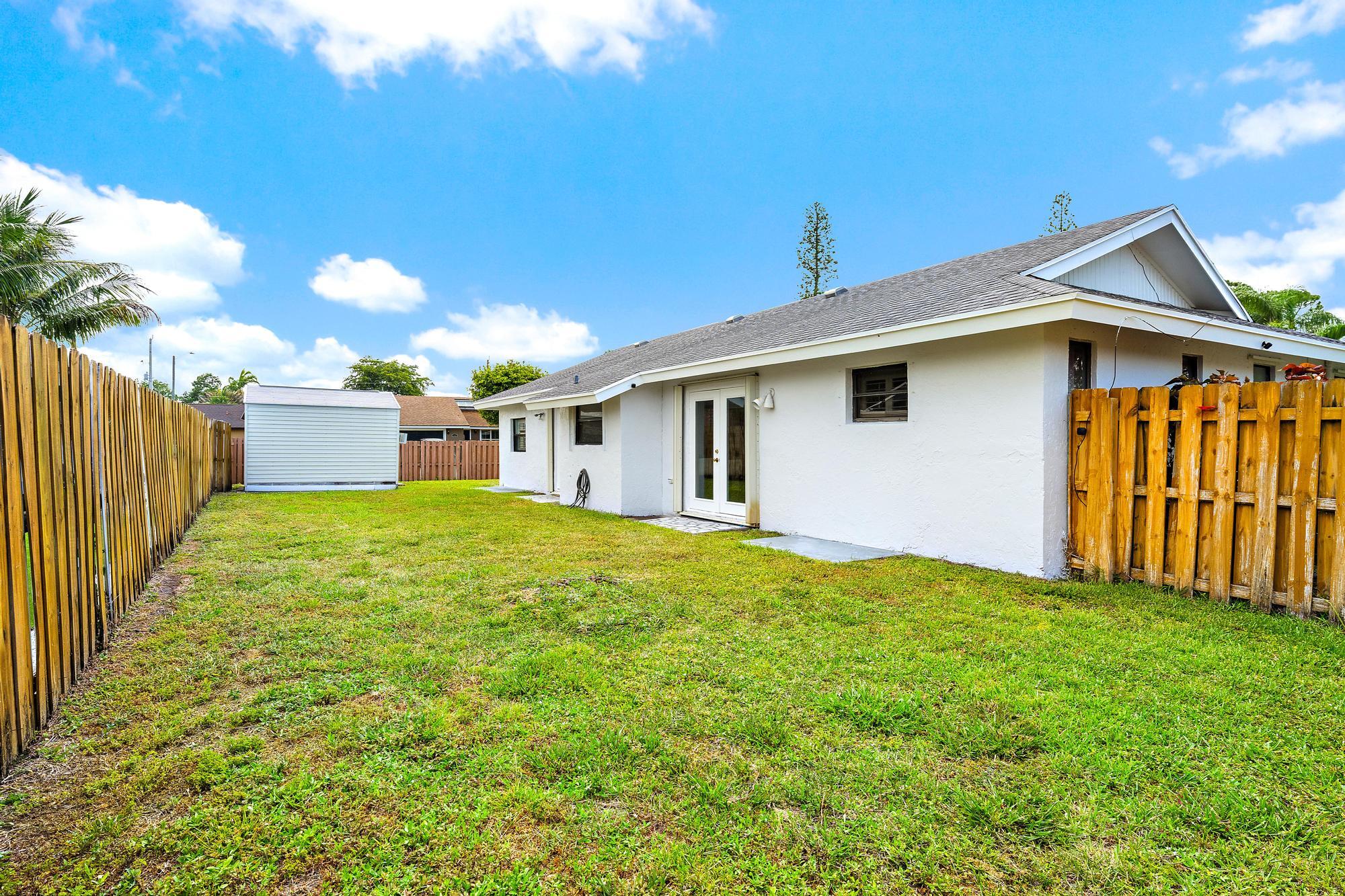 3962 Winfield Road Boynton Beach, FL 33436 - Photo 20 of 22 Fully Fenced Yard + Shed