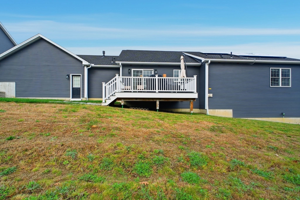 39 Jean Circle Chicopee, MA 01020 - Photo 28 of 33 a front view of a house with a garden