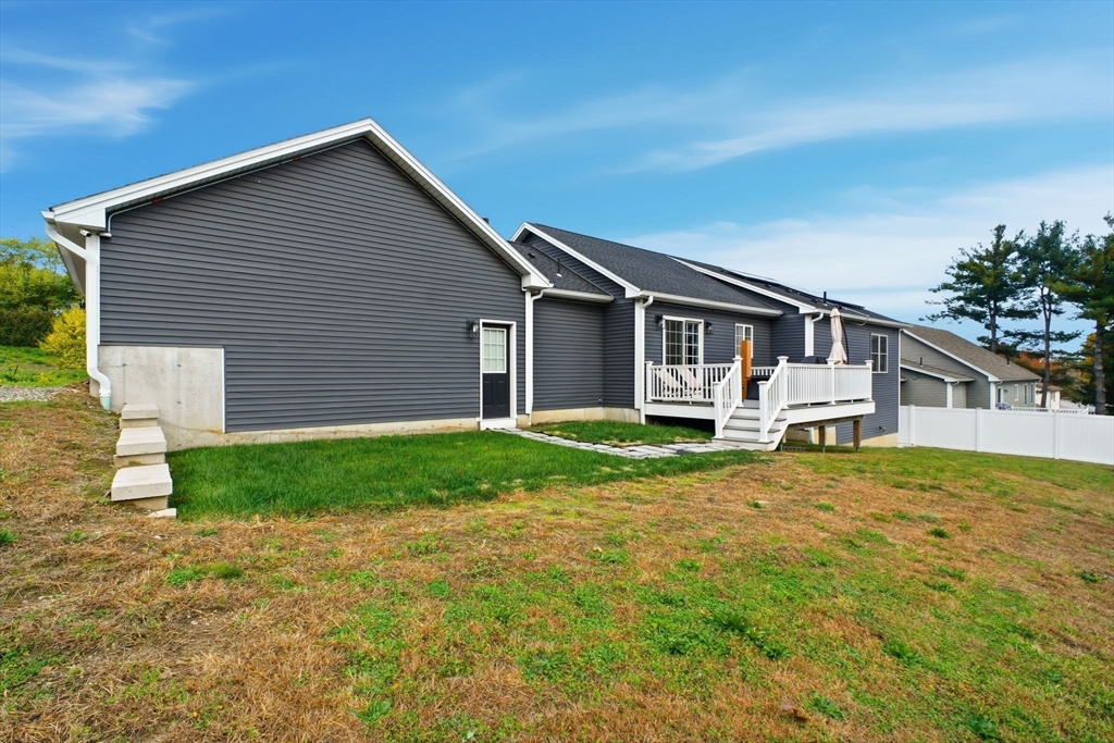 39 Jean Circle Chicopee, MA 01020 - Photo 29 of 33 a front view of a house with a yard