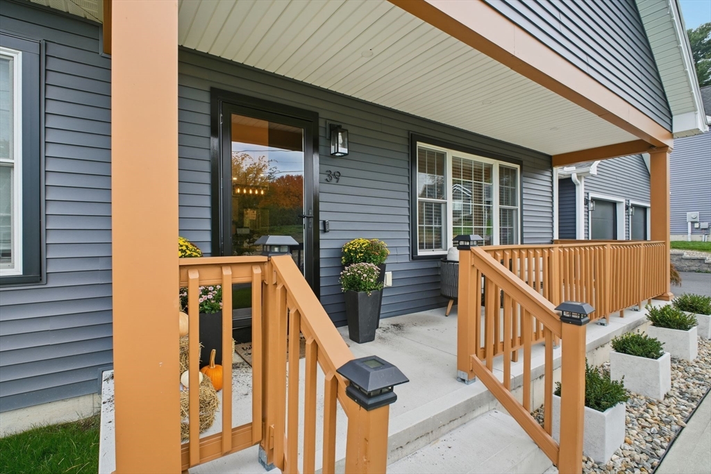 39 Jean Circle Chicopee, MA 01020 - Photo 5 of 33 a view of balcony with deck and furniture