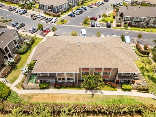 a view of a swimming pool with an outdoor seating