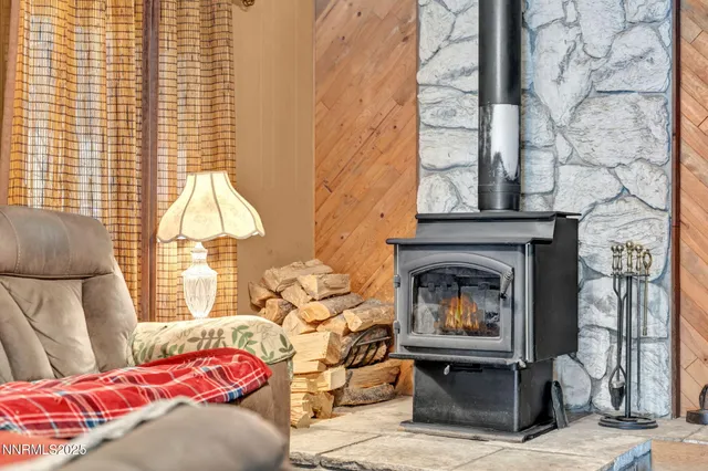 a kitchen with stainless steel appliances a stove a sink and a microwave