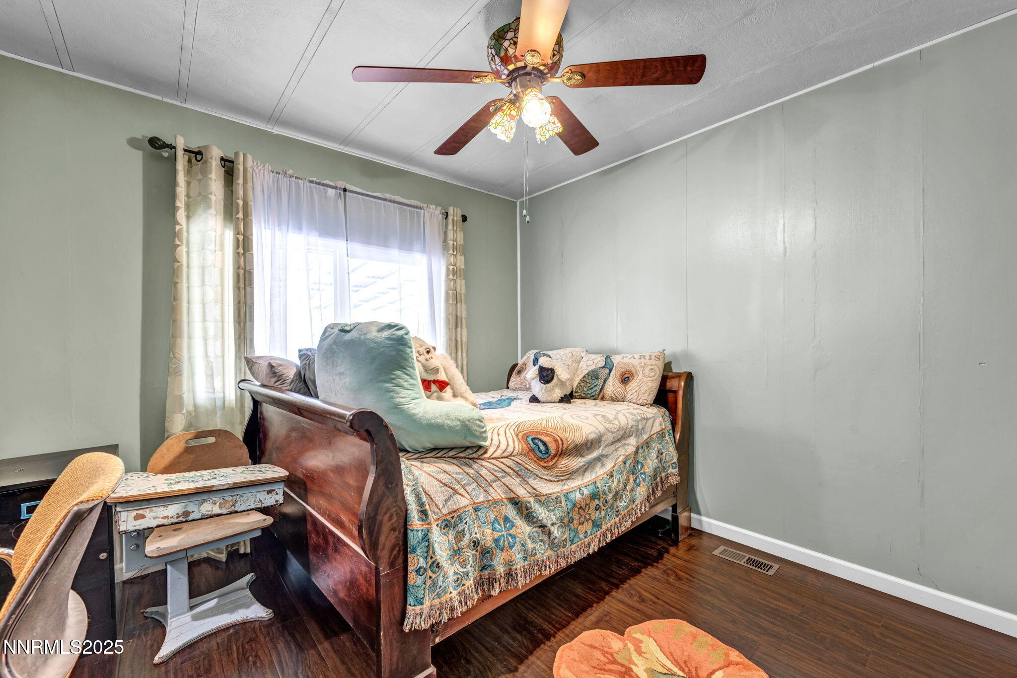 4000 Bobolink Circle Reno, NV 89508 - Photo 19 of 66 a bed room with a bed and a window