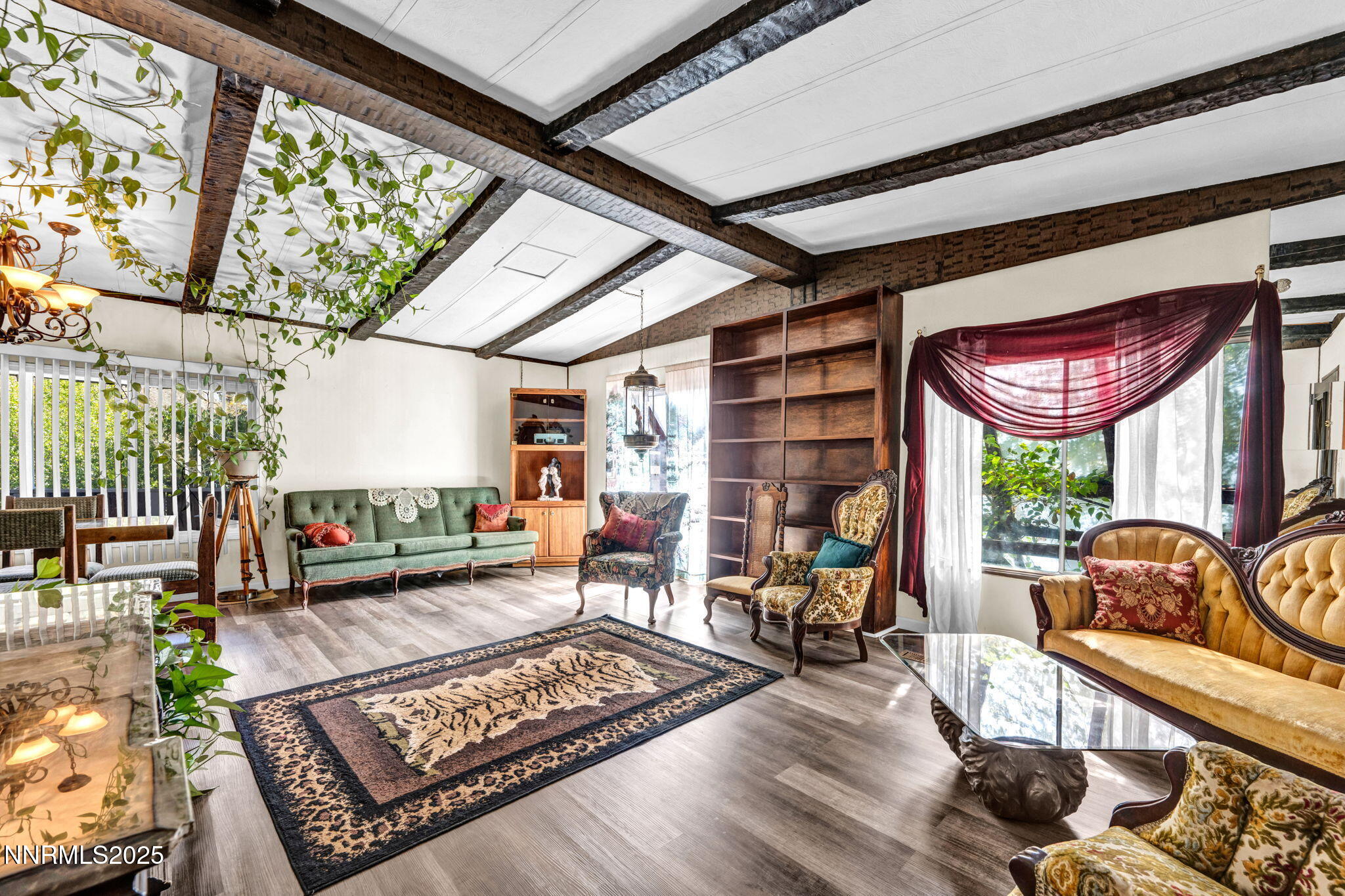 4000 Bobolink Circle Reno, NV 89508 - Photo 30 of 66 a living room with furniture and a floor to ceiling window