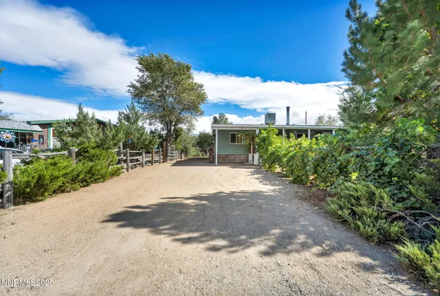 a view of a road with a building in the background