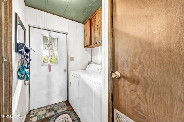 a bathroom with a shower and a curtain