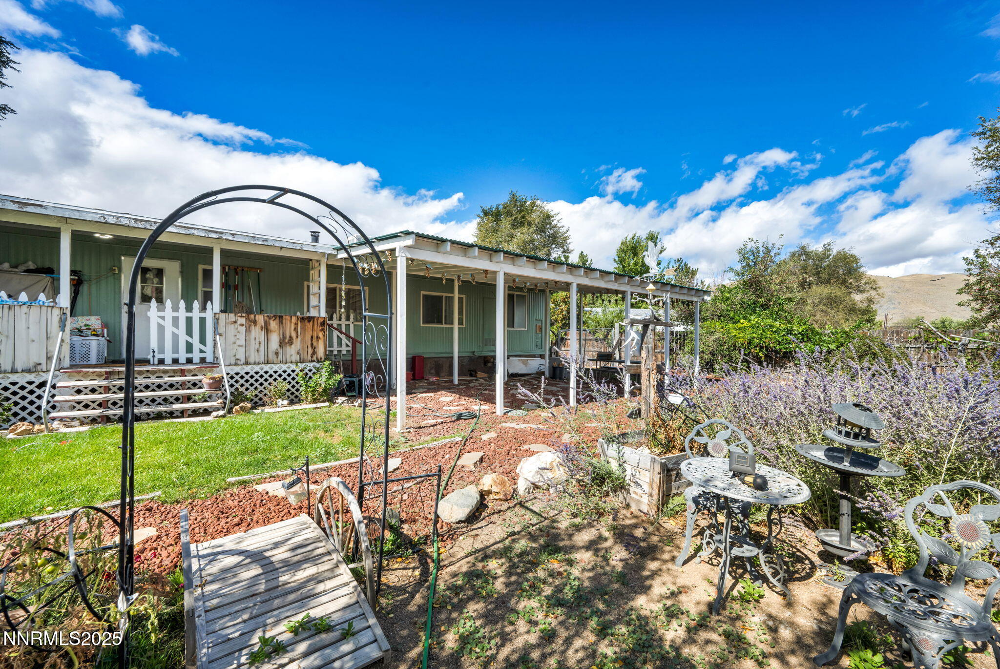4000 Bobolink Circle Reno, NV 89508 - Photo 45 of 66 a view of a house with backyard porch and garden