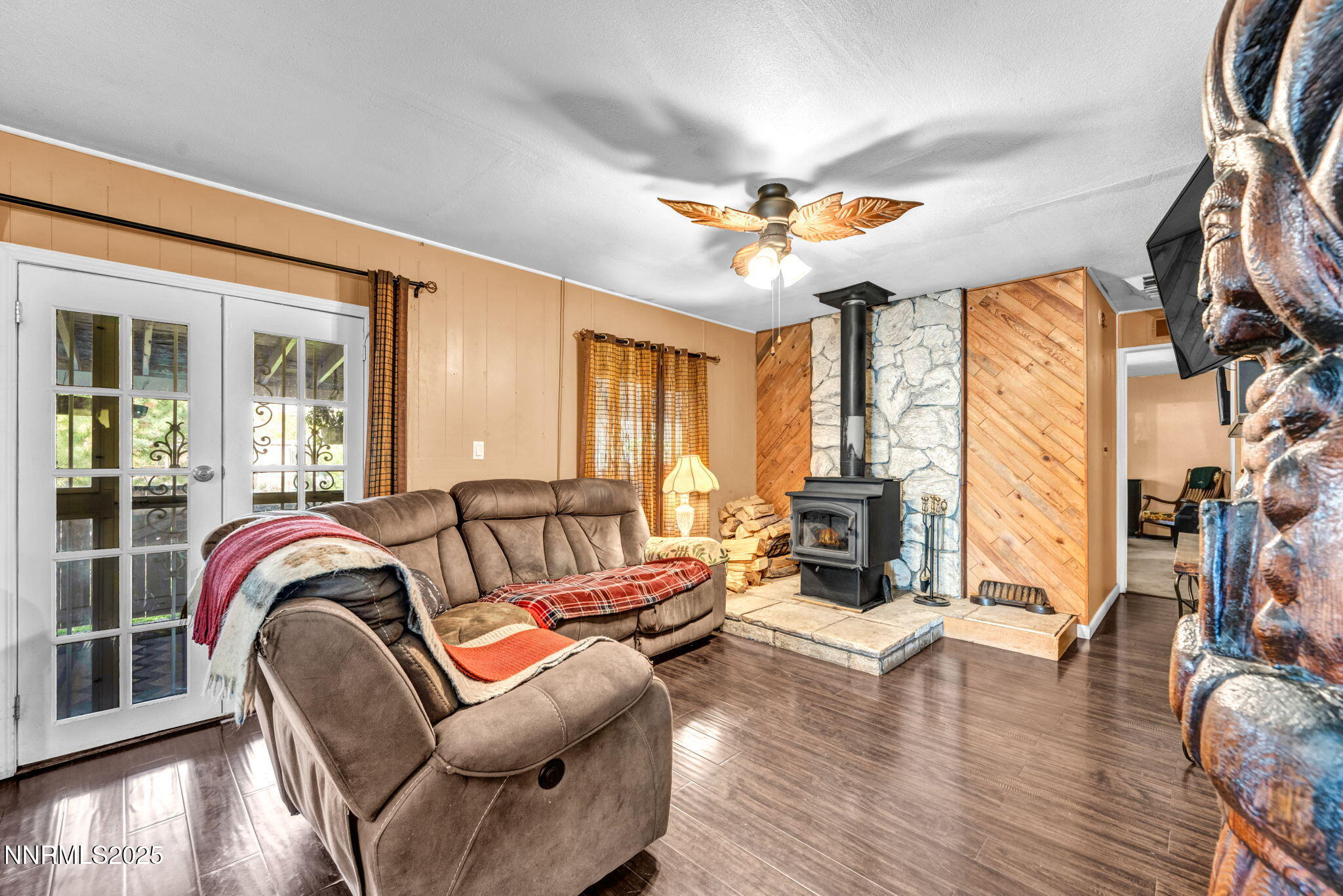 4000 Bobolink Circle Reno, NV 89508 - Photo 8 of 66 a living room with furniture a fireplace and wooden floor