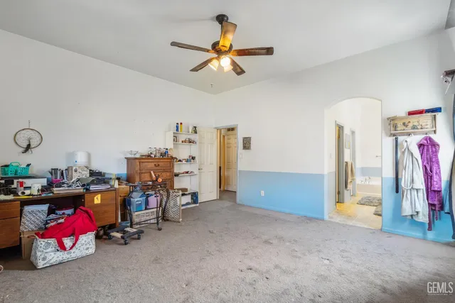 a bathroom with a tub a double vanity sink and mirror