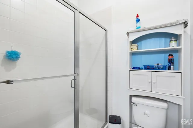 a bathroom with a double vanity sink and mirror