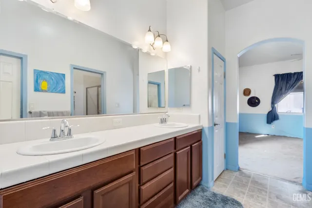a view of a porch with furniture and backyard