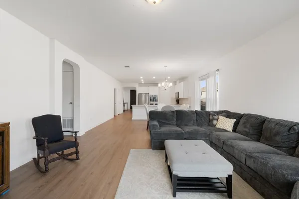 a living room with furniture and a couch