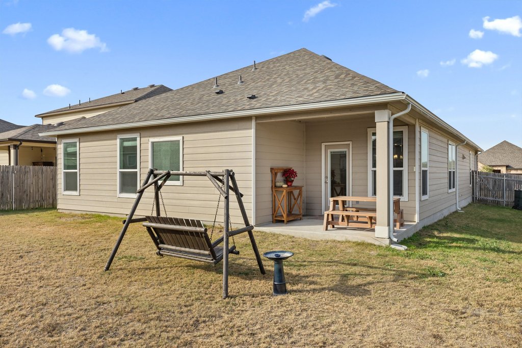 1926 Dragonfly Loop Bastrop, TX 78602 - Photo 27 of 33 a view of a house with backyard