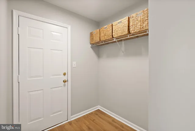 a bedroom with a bed and couch