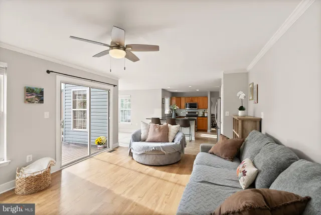 a white bath tub sitting in a bathroom next to a window