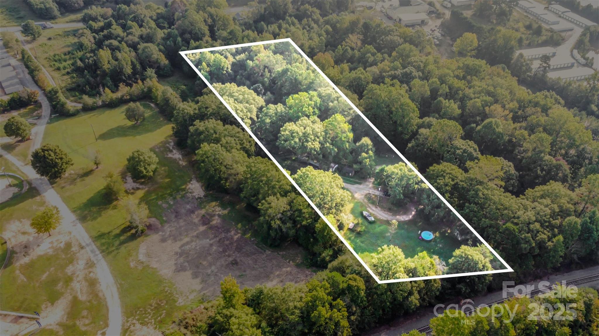 3164 Andrew Link Road Iron Station, NC 28080 - Photo 15 of 17 an aerial view of a residential houses with outdoor space