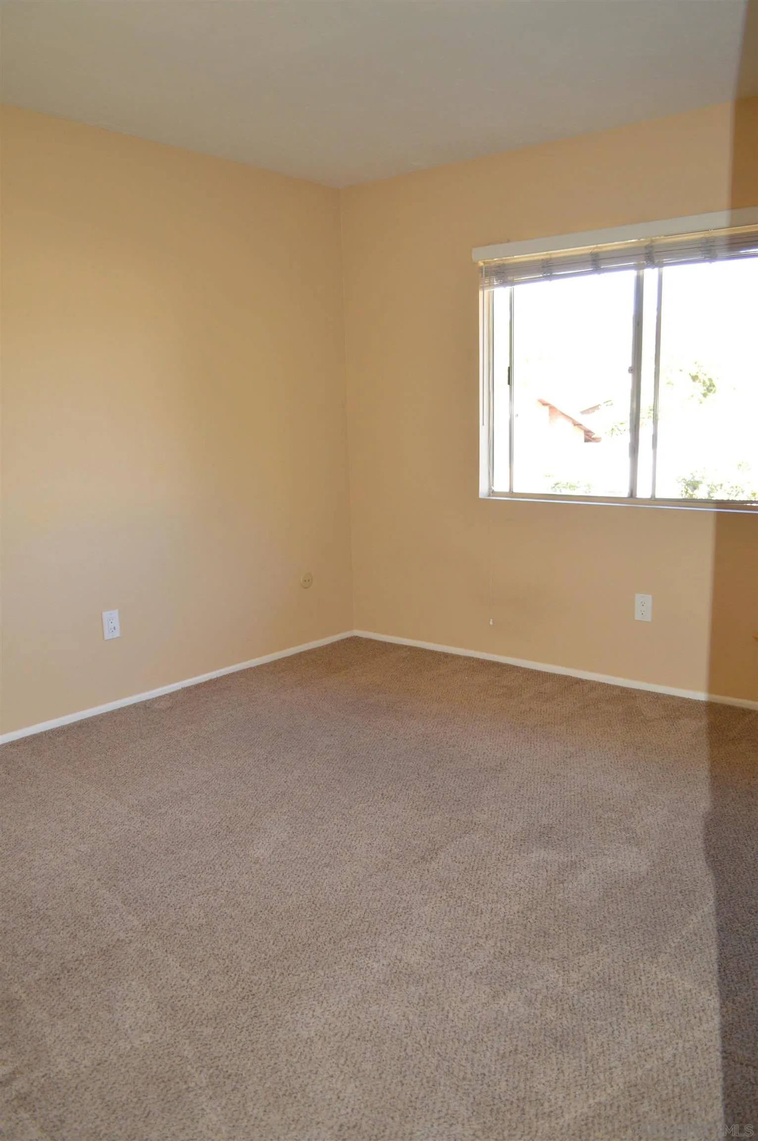13353 Sutter Mill Road Poway, CA 92064 - Photo 13 of 14 an empty room with a window