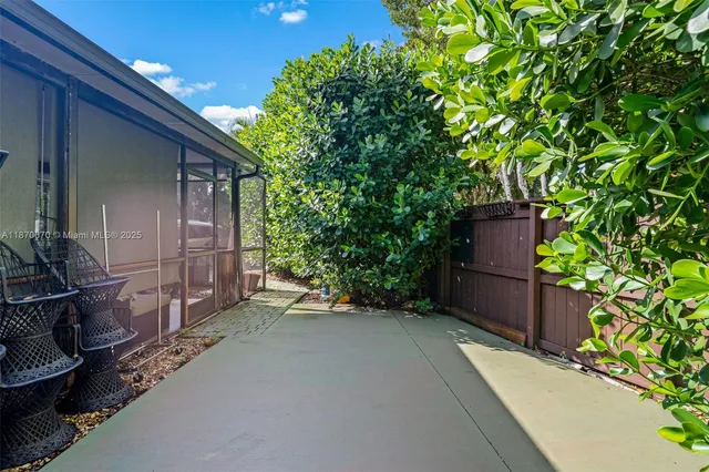 a view of backyard with trampoline