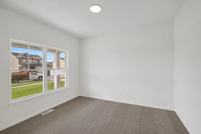 an empty room with window