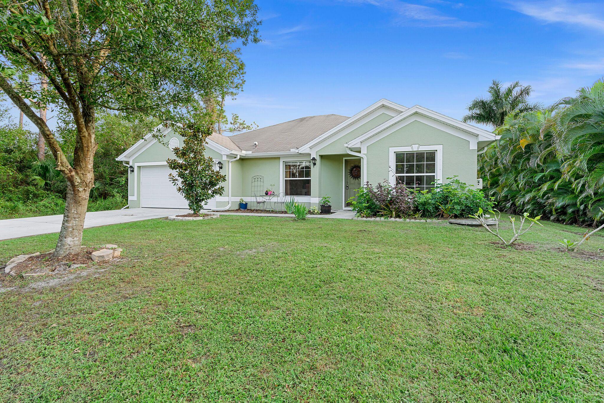 1322 Southwest Del Rio Boulevard Port St. Lucie, FL 34953 - Photo 1 of 21 Front