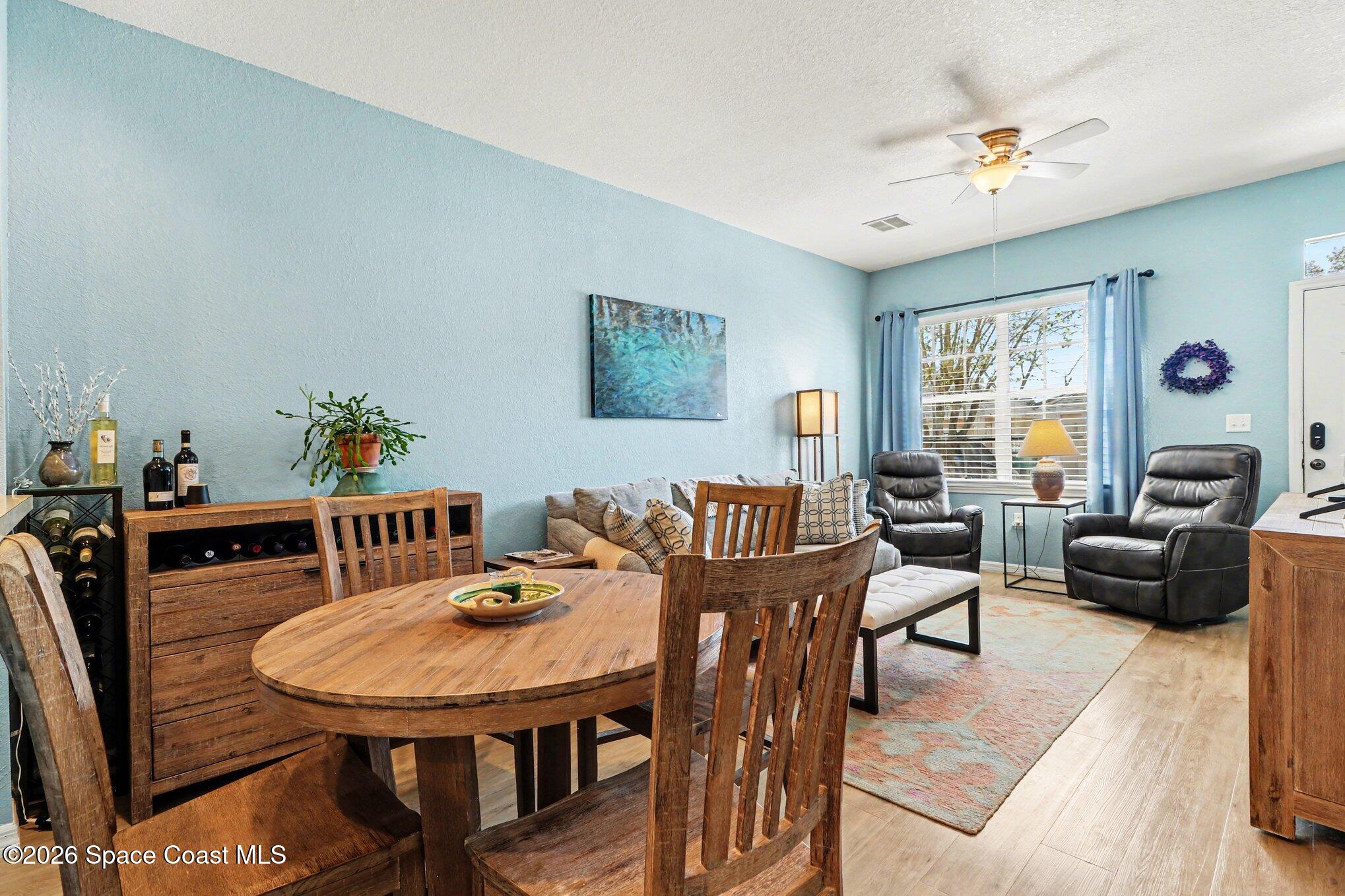 3955 Almeida Court, Unit 103 Melbourne, FL 32901 - Photo 7 of 32 a view of a dining room with furniture