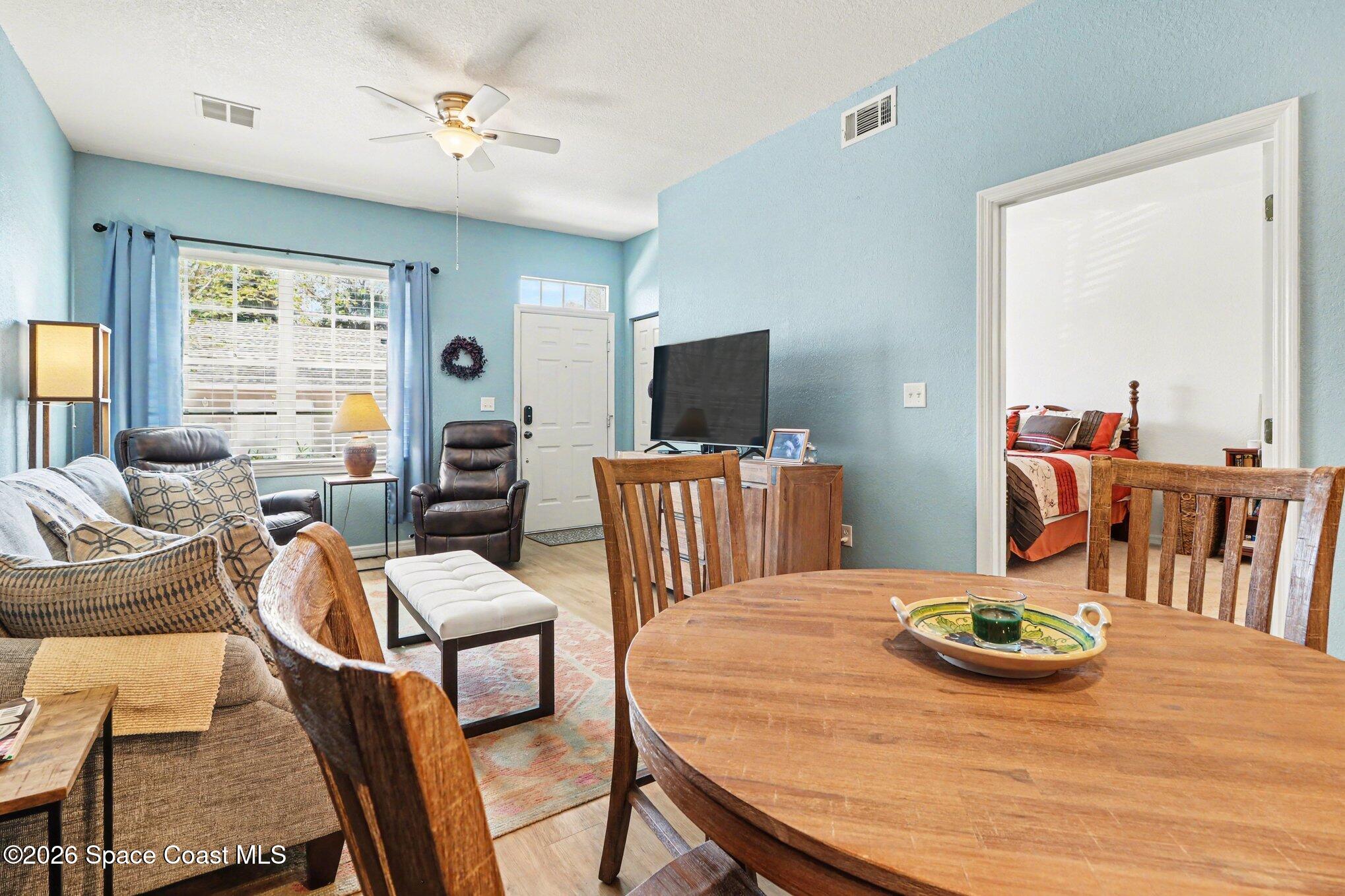3955 Almeida Court, Unit 103 Melbourne, FL 32901 - Photo 8 of 32 a view of a dining room with furniture