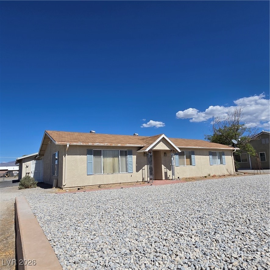 630 East Simkins Road Pahrump, NV 89060 - Photo 1 of 50 Single story home with stucco siding
