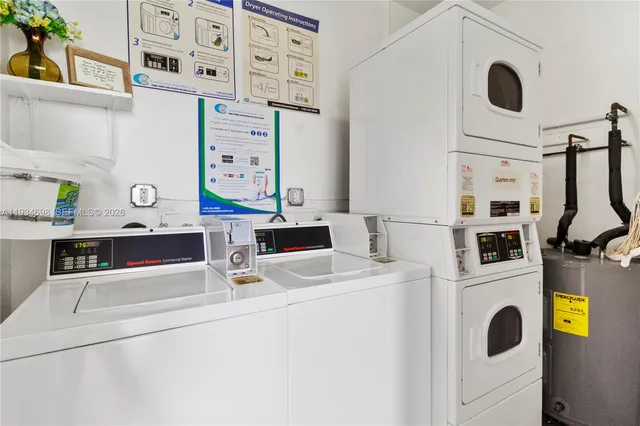 a view of a terrace with furniture and a city view