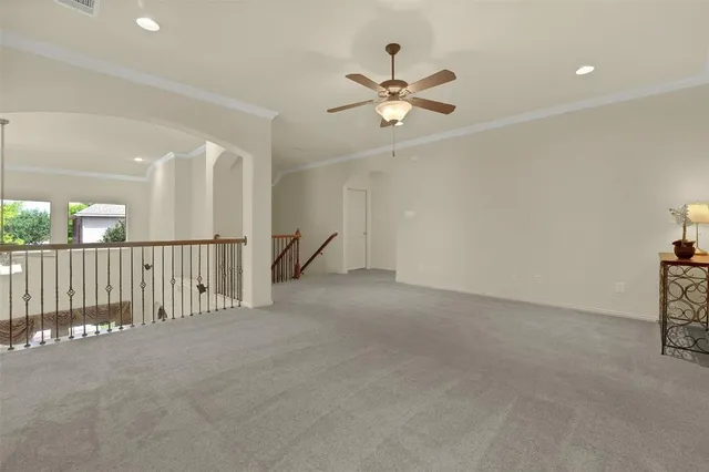 a view of a hallway with windows