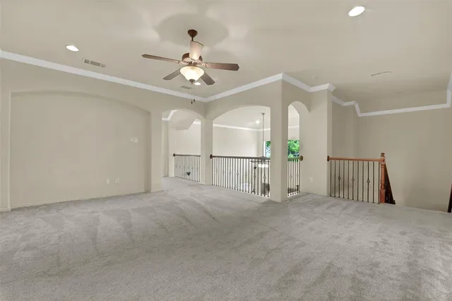 a view of a livingroom with a ceiling fan