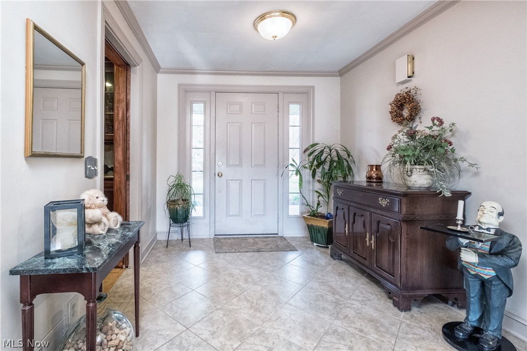 2815 Westdale Road Northwest Canton, OH 44708 - Photo 4 of 33 Spacious foyer with tile floors.
