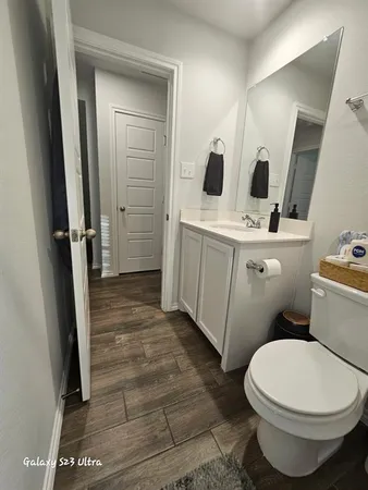 a bathroom with sink and mirror