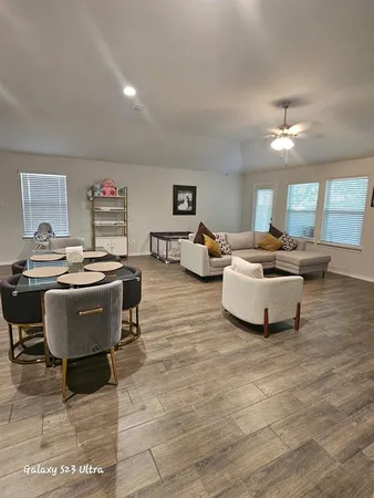 a living room with a couch and a table