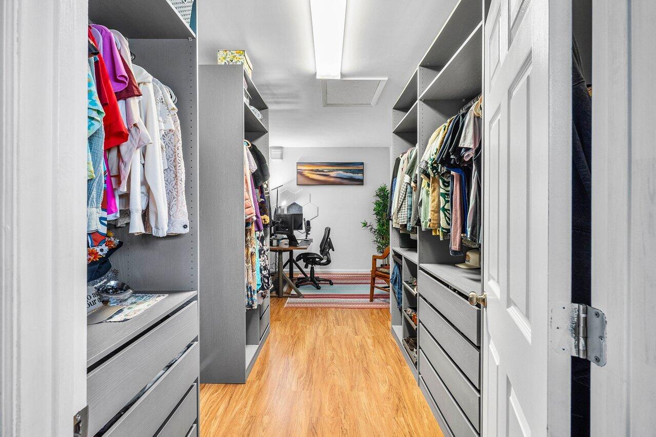 3064 Rostan Lane Palm Springs, FL 33461 - Photo 17 of 49 a view of a walk in closet