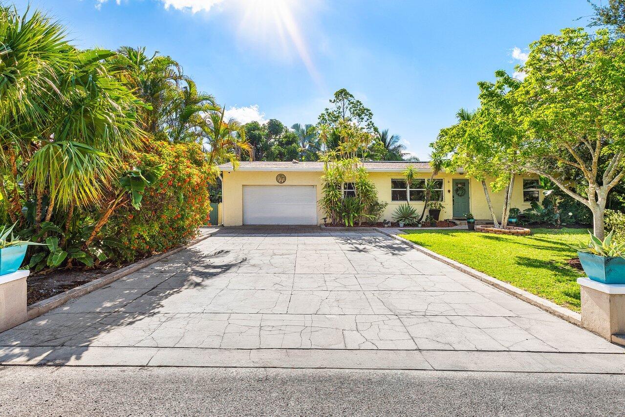 3064 Rostan Lane Palm Springs, FL 33461 - Photo 2 of 49 a view of house with yard