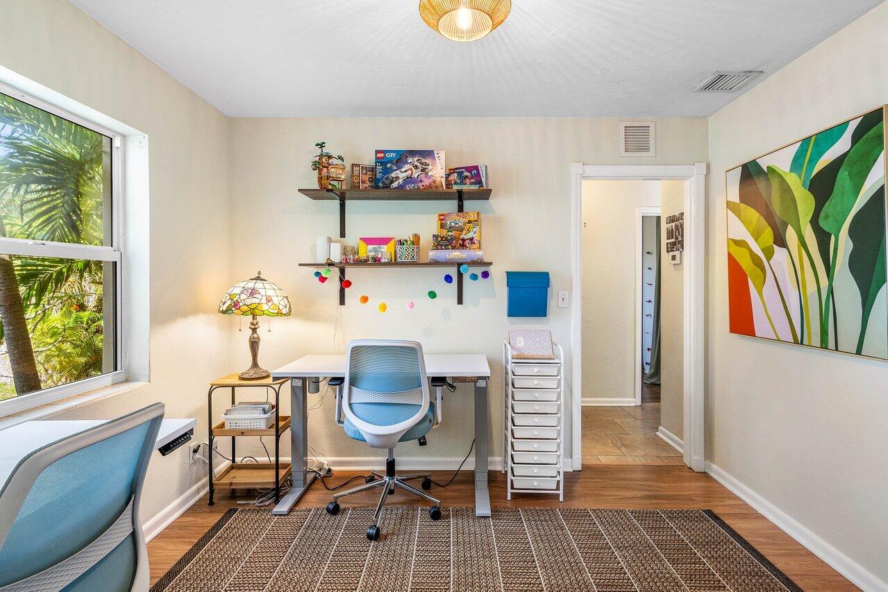 3064 Rostan Lane Palm Springs, FL 33461 - Photo 26 of 49 a workspace with furniture hardwood and a window