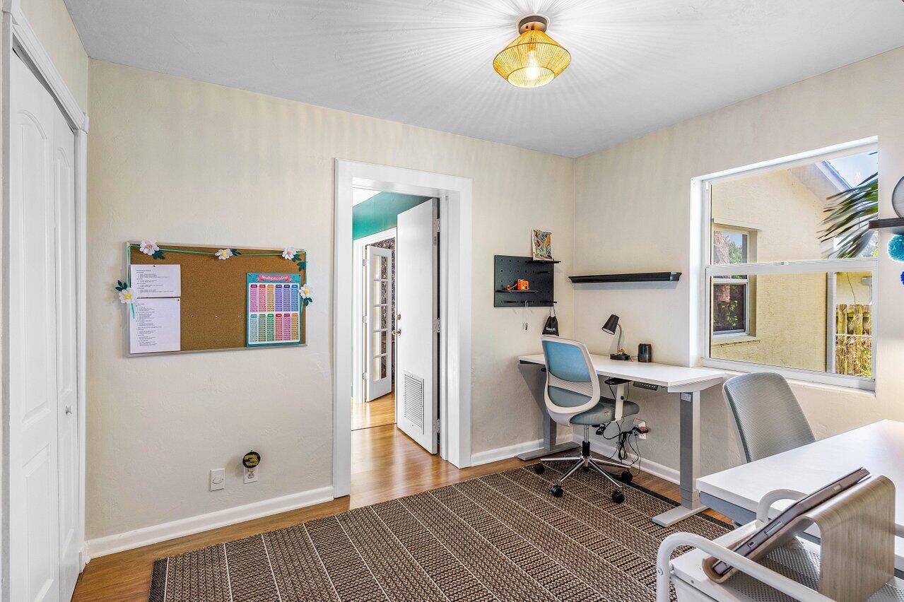 3064 Rostan Lane Palm Springs, FL 33461 - Photo 27 of 49 a view of a workspace with furniture and a window