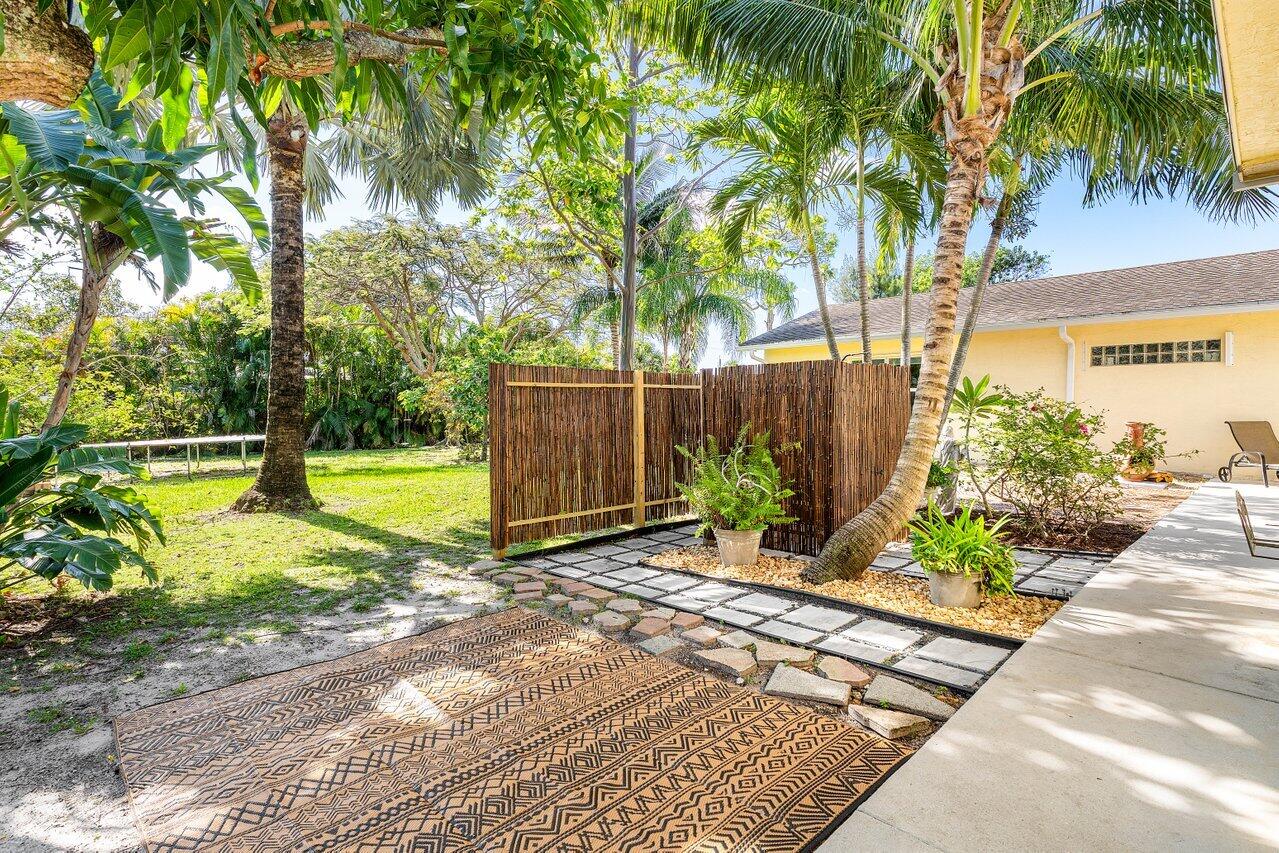 3064 Rostan Lane Palm Springs, FL 33461 - Photo 35 of 49 a view of a park with trees