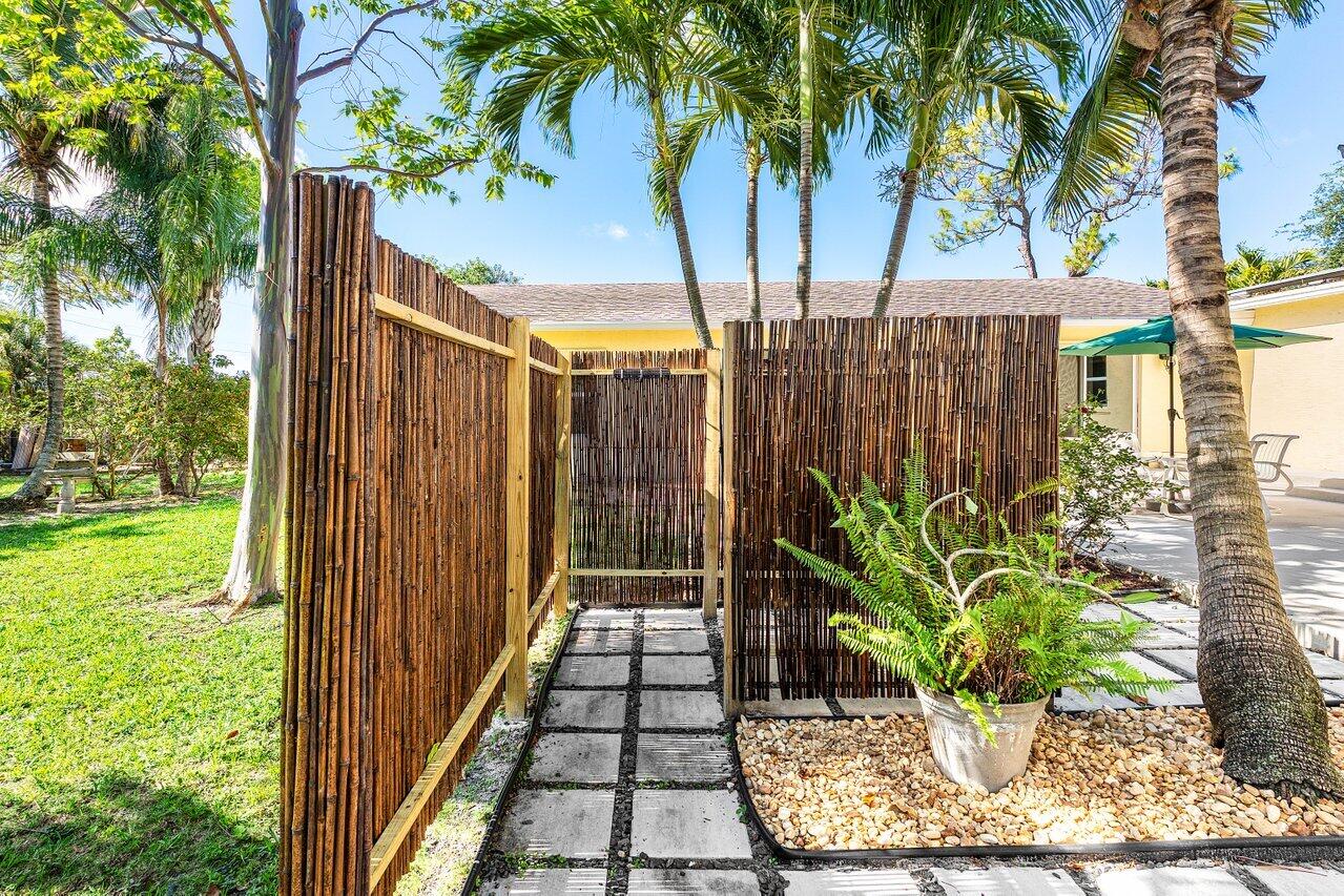 3064 Rostan Lane Palm Springs, FL 33461 - Photo 36 of 49 a view of a garden