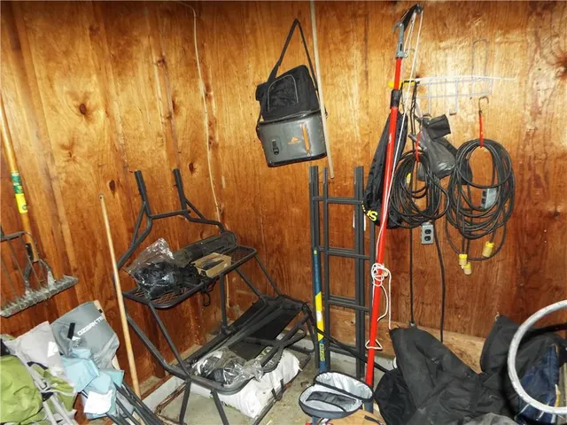 a living room with couches and painted walls
