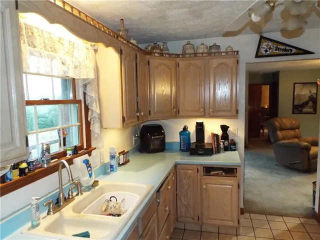 a kitchen with granite countertop lots of counter top space